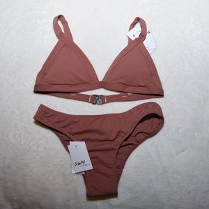 Lioness Anjelica Houston bikini